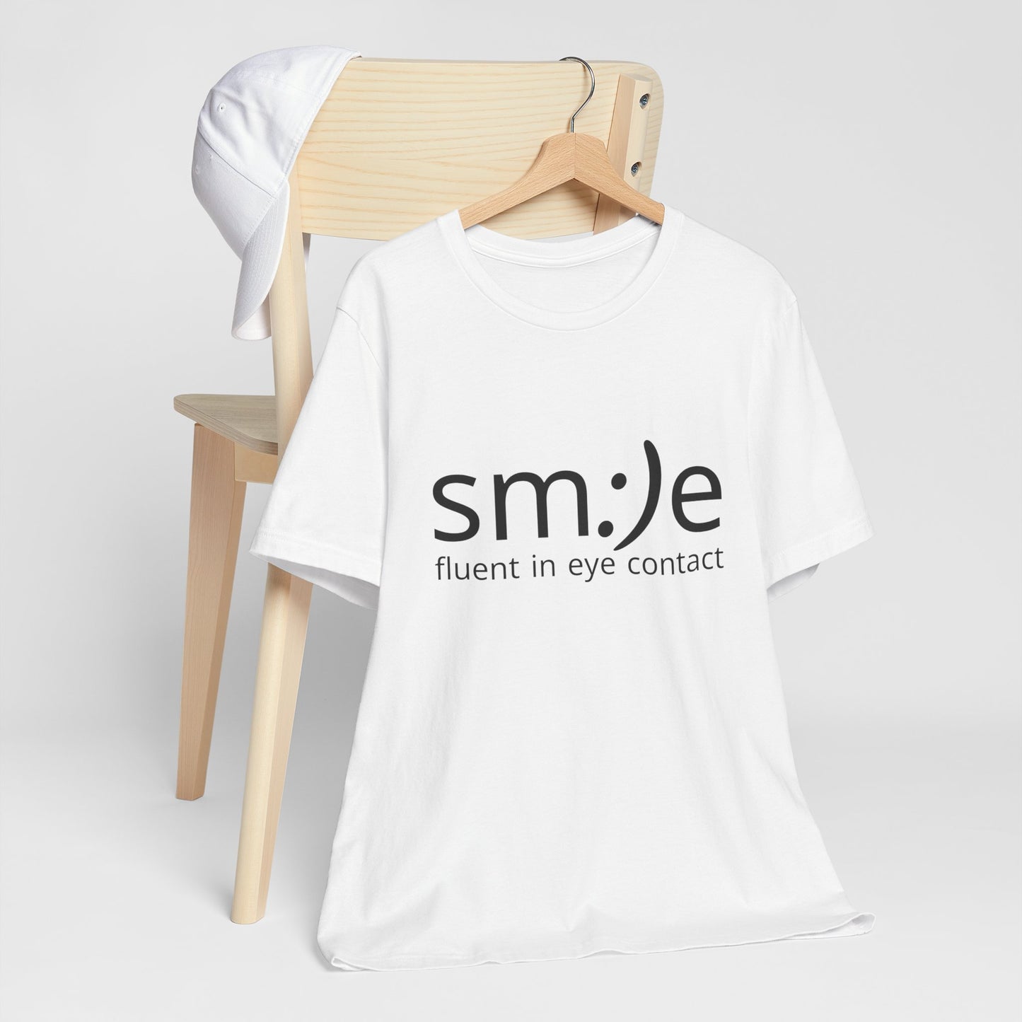 Unisex Jersey Short Sleeve Tee | sm:)e Fluent in Eye Contact | Confidence Streetwear