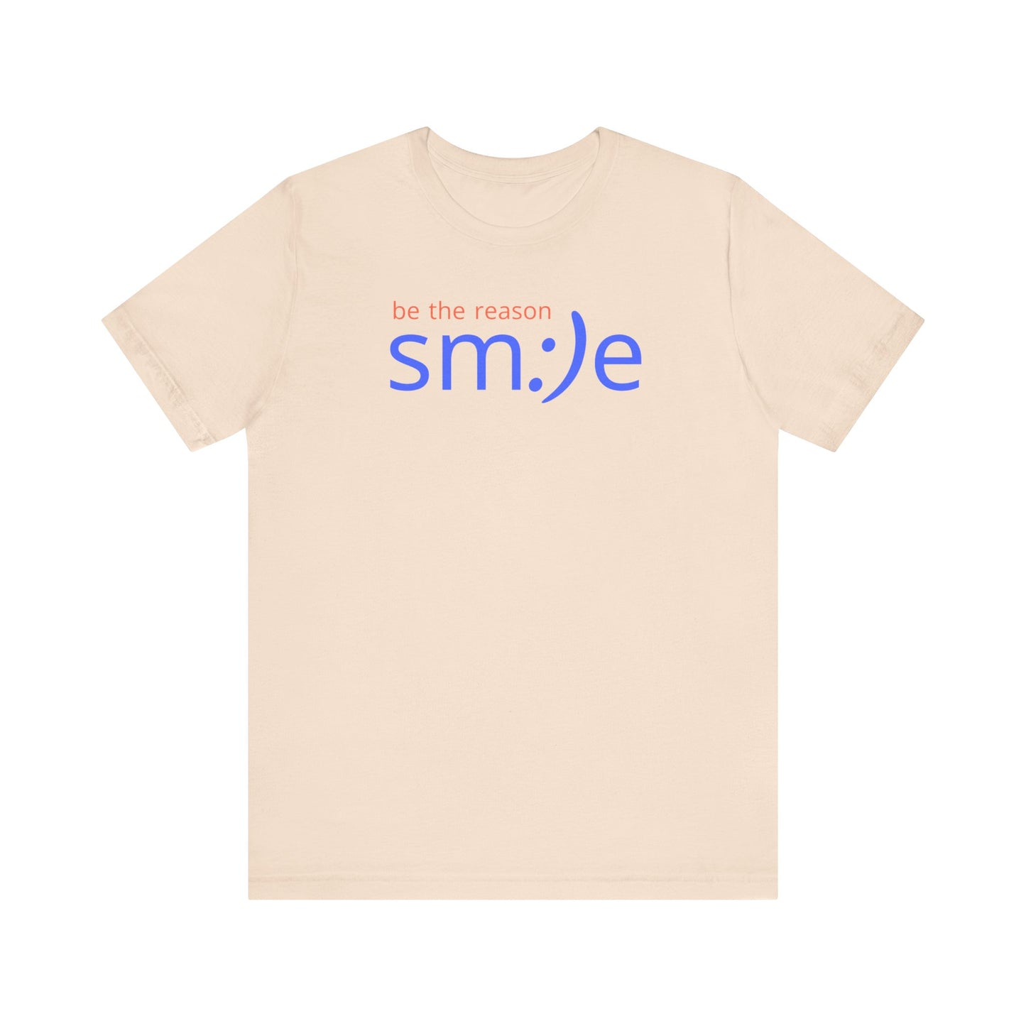 Beige t-shirt with 'be the reason smile' text on a white background