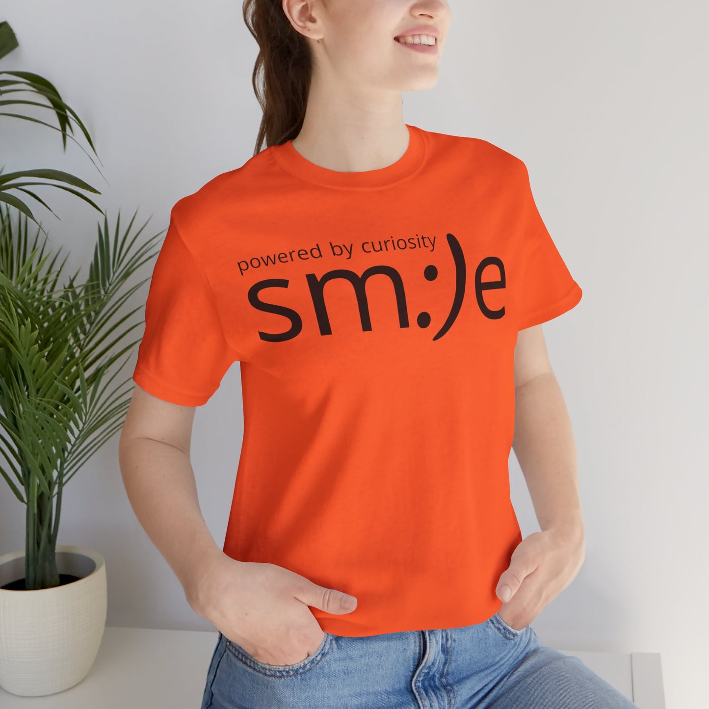 Powered by Curiosity sm:)e T-Shirt | Streetwear Motivational Graphic Tee