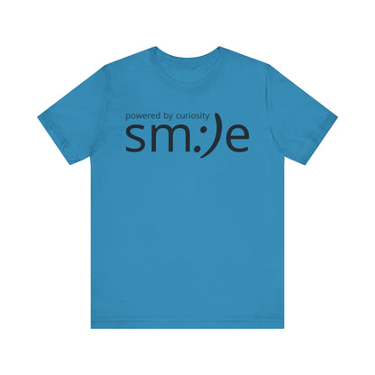 Powered by Curiosity sm:)e T-Shirt | Streetwear Motivational Graphic Tee