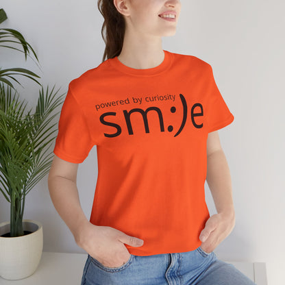 sm:)e Powered by Curiosity T-Shirt | Inspirational Unisex Graphic Tee
