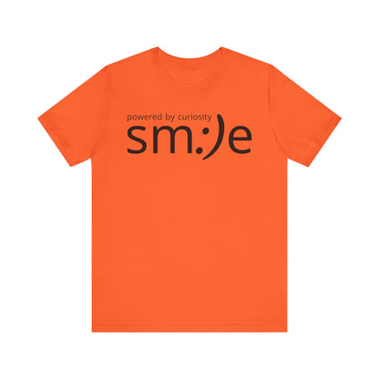 sm:)e Powered by Curiosity T-Shirt | Inspirational Unisex Graphic Tee